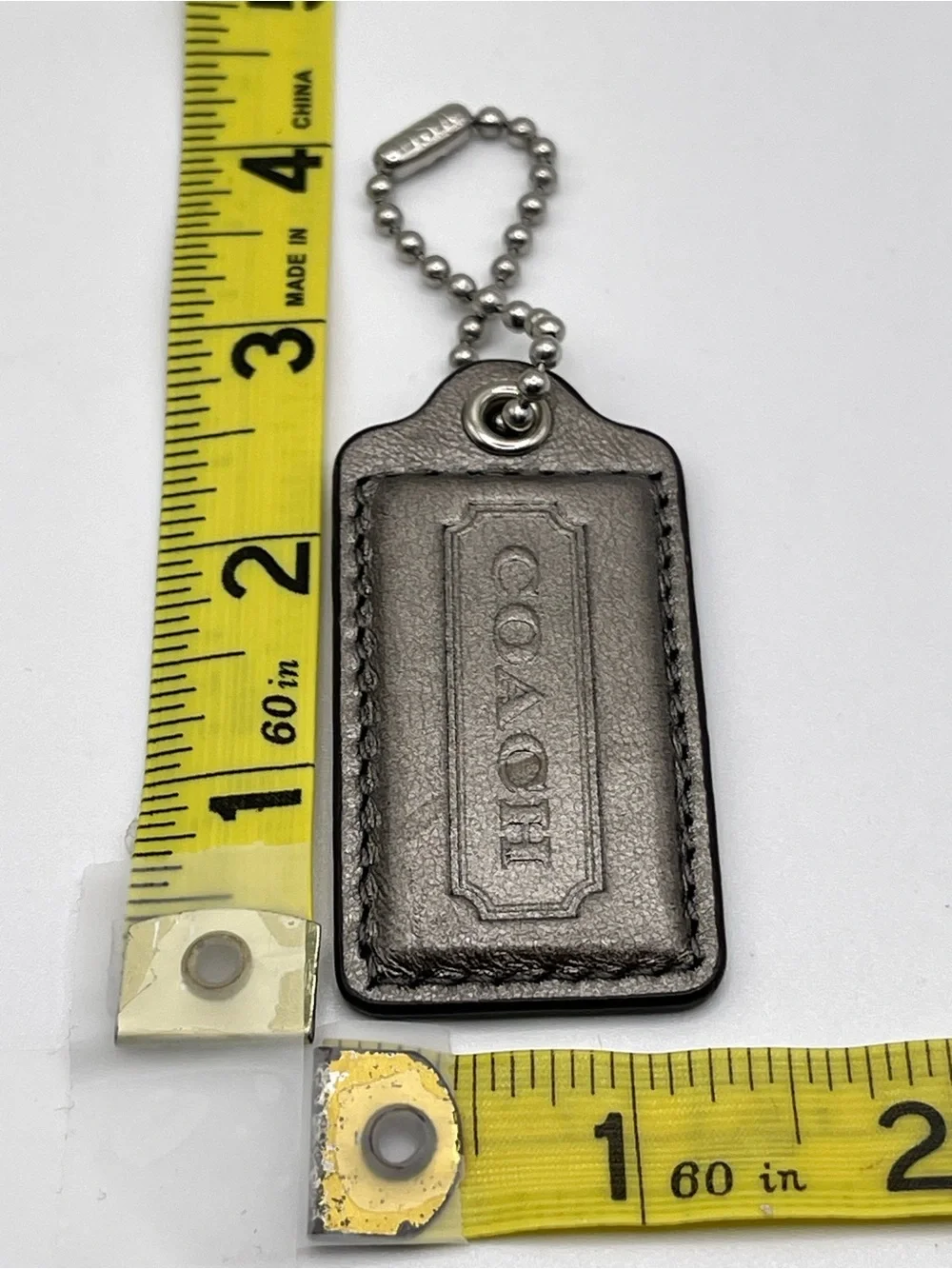 Coach iridescent dark